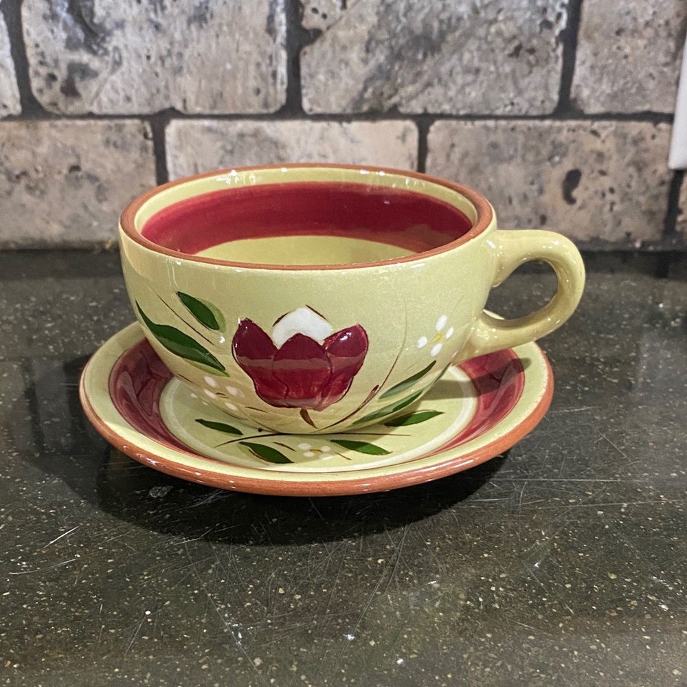 Antique teacup with saucer . Stangl pottery. Magholia design